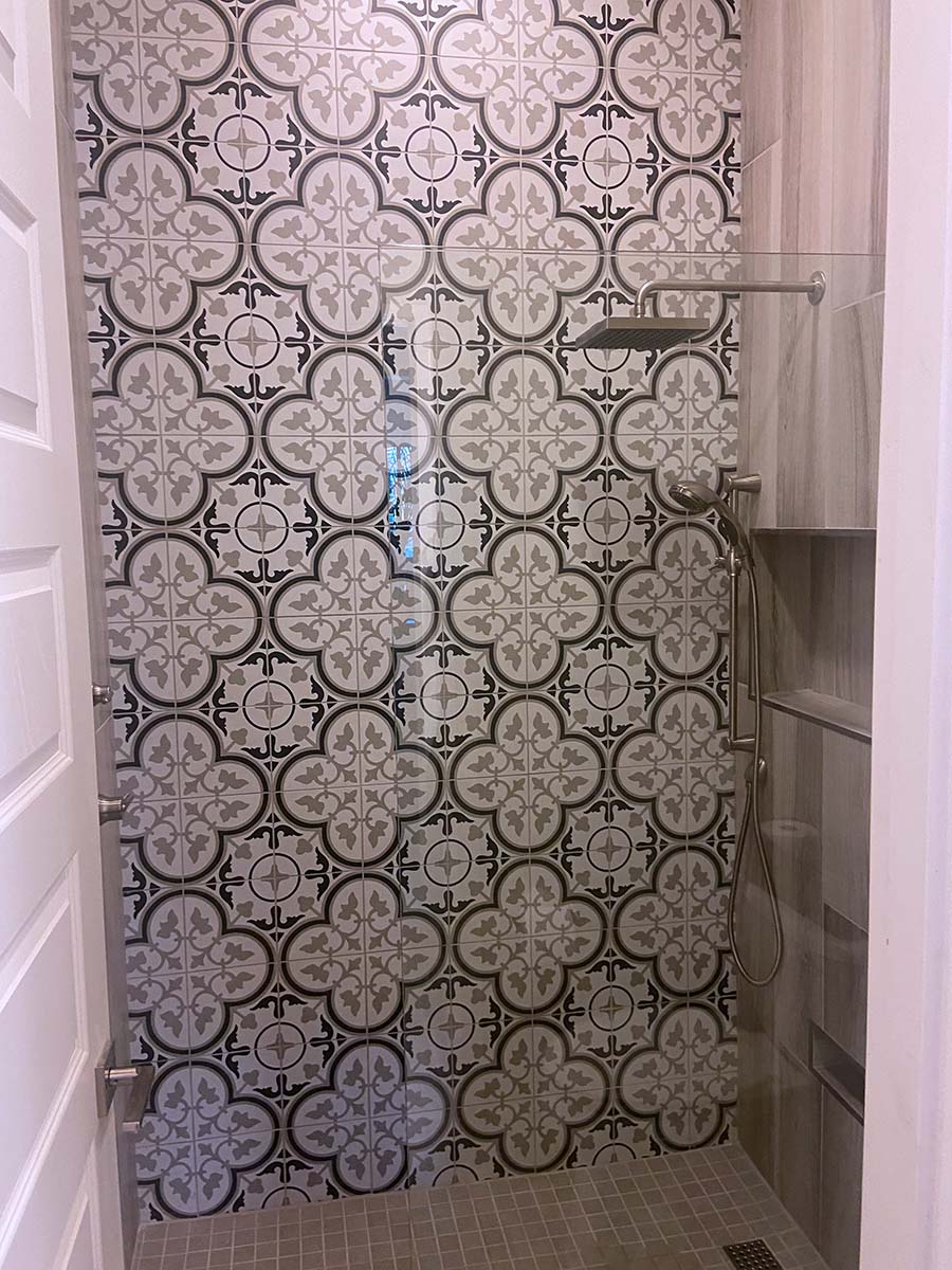 Glass and tile shower after bathroom remodel
